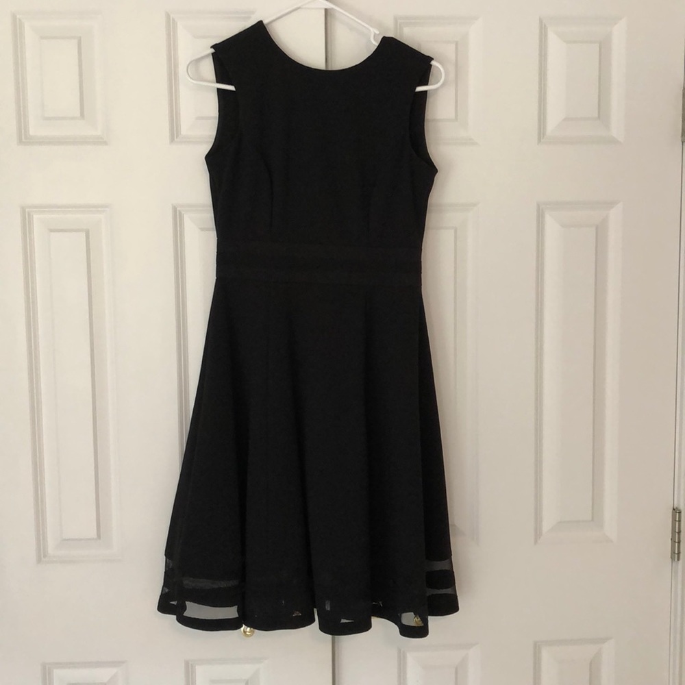 A line black tuxedo fabric dress from Calvin Klein